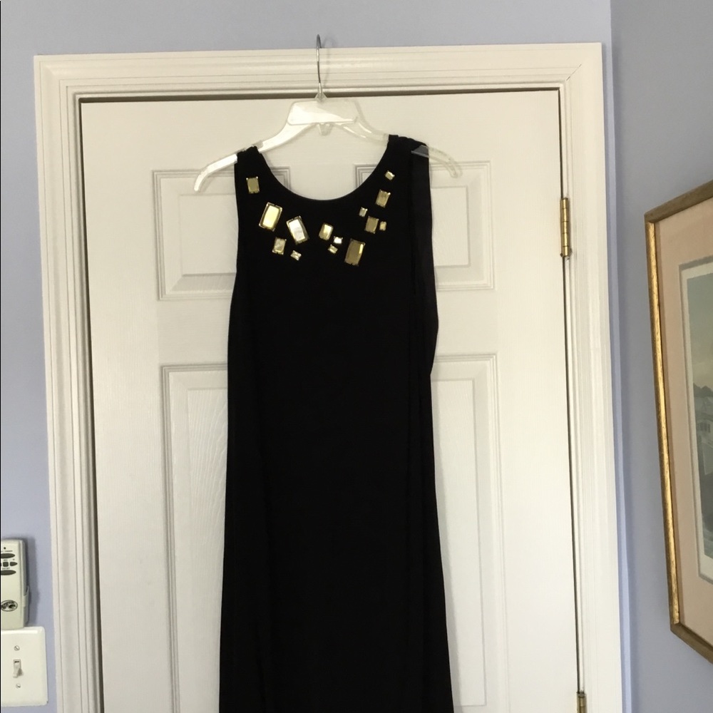 Backless black cocktail with large beads on front